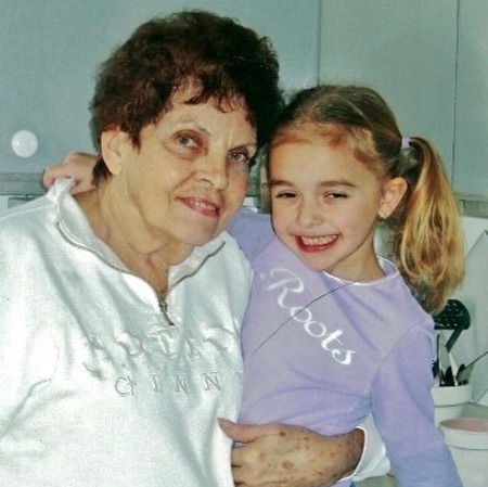 Nikki Roumel with her grandmother Irene Roumel during her early age. 